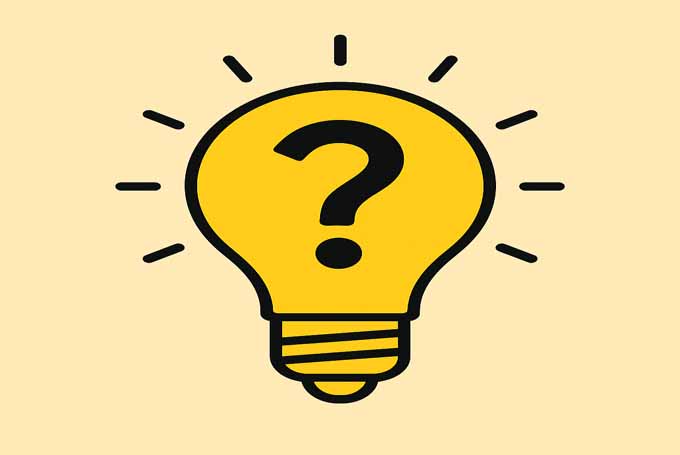 Flat illustration of a glowing yellow lightbulb with a question mark inside, symbolizing answers to common solar energy questions in Karachi.