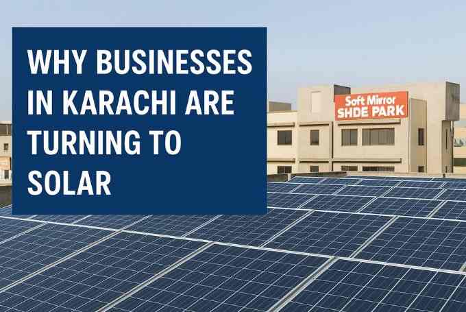 Solar panels on a Karachi commercial rooftop with nearby business buildings, highlighting why small businesses are turning to solar energy.