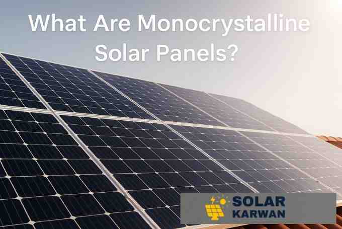 Close-up of sleek black monocrystalline solar panels installed on a Karachi rooftop, angled under bright sunlight with clear sky in the background. At the bottom is Solar Karwan's icon.